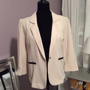 Cream blazer with black trim